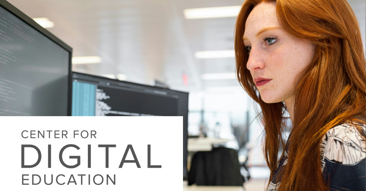 Person viewing code on computer monitors in a modern office setting.  Text on the image: CENTER FOR DIGITAL EDUCATION
