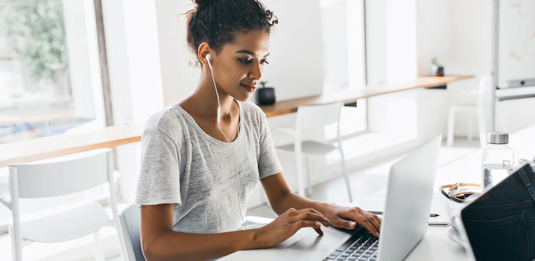 A woman working on a laptop