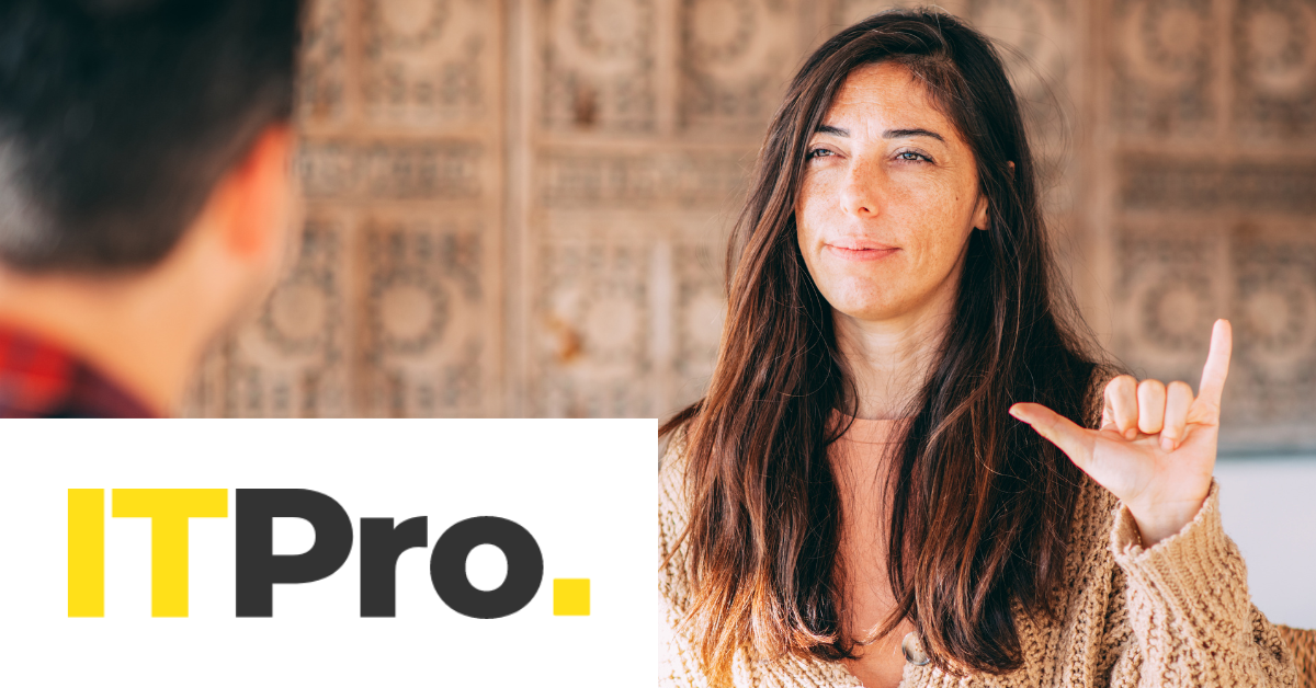 A young woman smiles and gestures in sign language. "ITPro." text is on the lower left. 