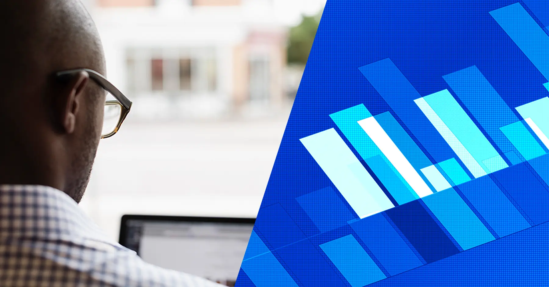 Photo of a man working on an instance of Blackboard on his laptop with a stylized blue graph overlaying the right side of the image