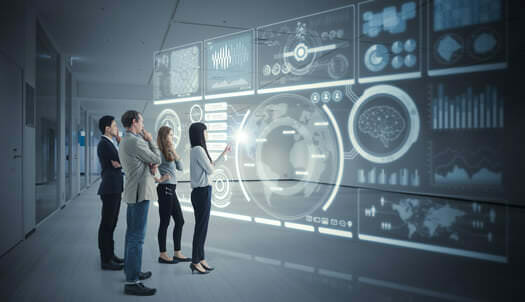 Four people looking at a data visualization